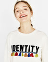 Sweater with slogan
